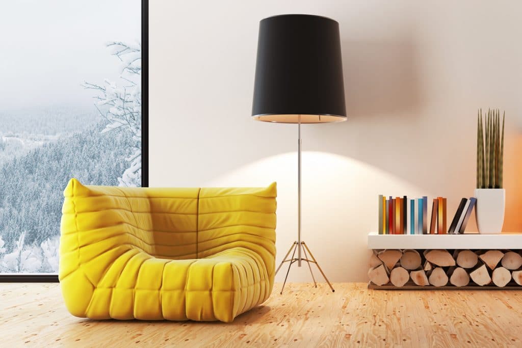 A-floor-lamp-next-to-a-comfortable-chair-1024x683-1
